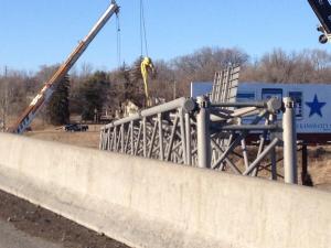 Traffic crews had to remove an overhead sign after it was struck on Tuesday, Feb. 18. (Photo: Eric Burke-WDAF-TV)