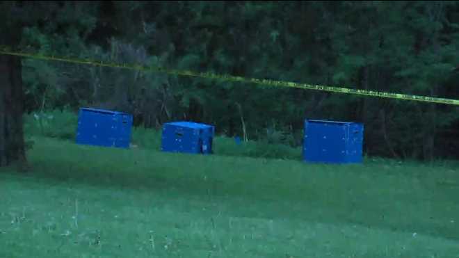 The property in Sedalia where authorities searched for more body parts after finding decomposed parts in a bin near a trailer.
