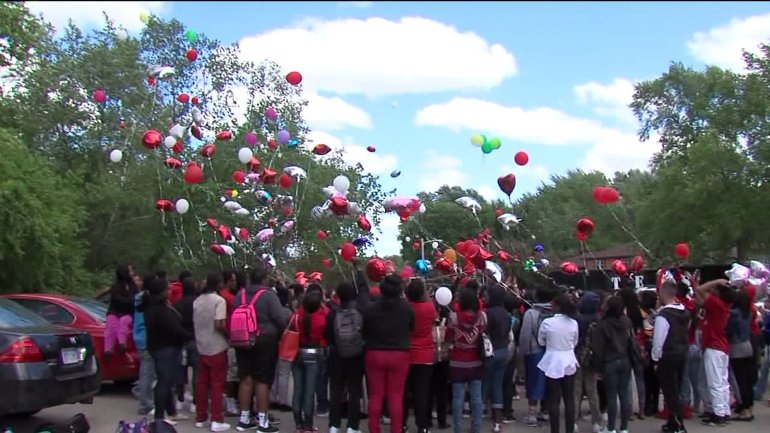 People gathered to remember the teen who died when she crashed her car, fleeing gunfire.