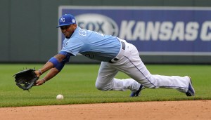  A ball hit by Jhonny Peralta of the St. Louis Cardinals gets past Alcides Escobar #2 of the Kansas City Royals in the eighth inning at Kauffman Stadium on May 24, 2015 in Kansas City, Missouri. (Photo by Ed Zurga/Getty Images)